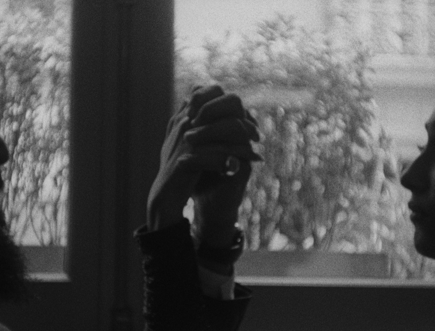 A hand at the window
